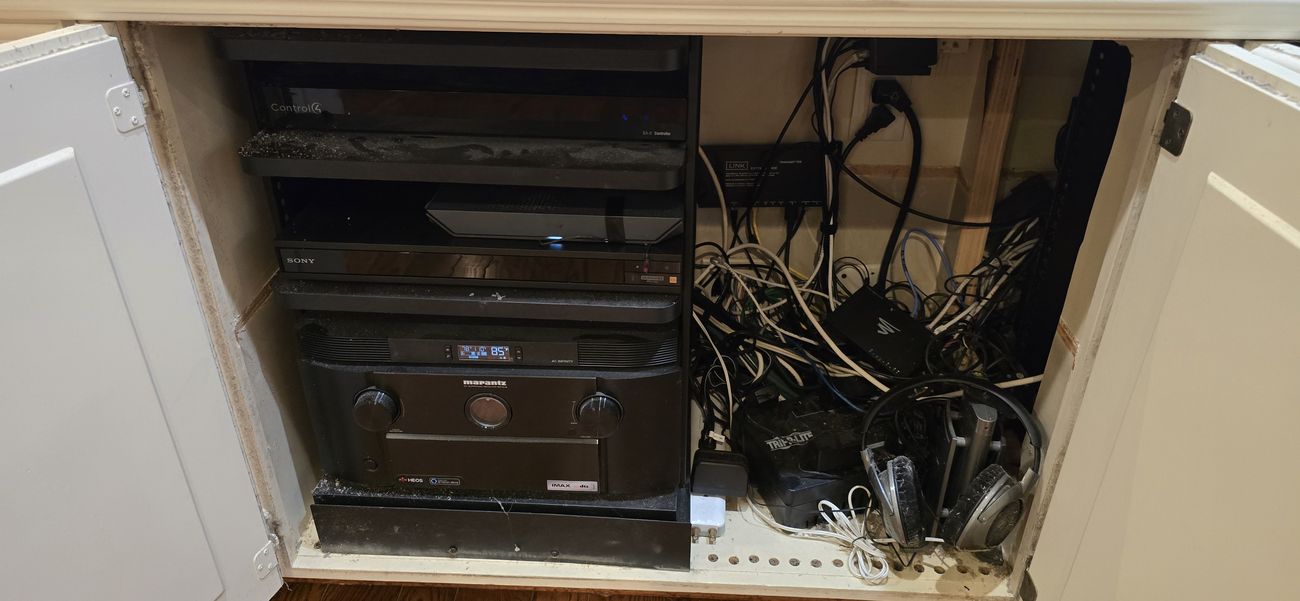A tangled, dusty AV and network install left behind by another company